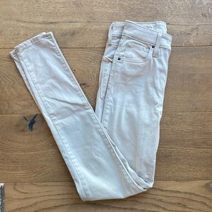 Cream high rise skinny Levi jeans